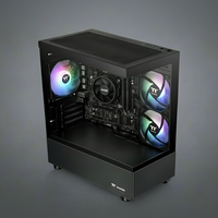 Glossy black computer case with RGB lighting on a gray background